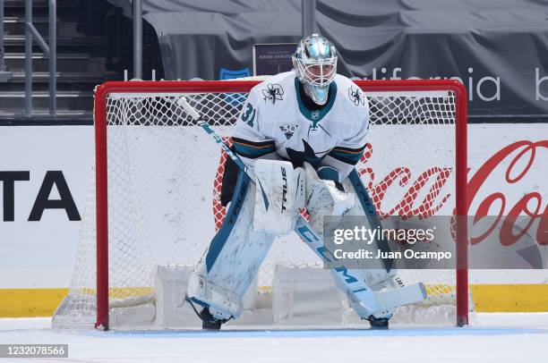 Martin Jones of the San Jose Sharks gets ready for the play during the first period against the Los Angeles Kings at STAPLES Center on April 2, 2021...