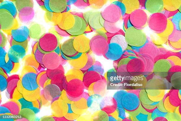 multicolored confetti on a white background. festive holiday concept - paper shredder on white stock pictures, royalty-free photos & images
