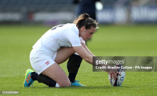 England's Emily Scarratt places the ball on the tee before a kick at goal during the Women's Guinness Six Nations match at Castle Park, Doncaster....