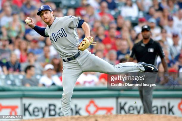 Third baseman Cory Spangenberg of the San Diego Padres throws toward first base in the third inning of a game against the Cleveland Indians at...