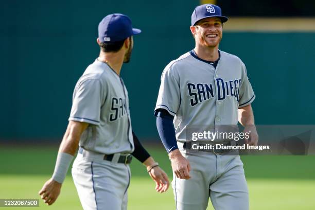 Third baseman Cory Spangenberg of the San Diego Padres laughs as he warms up prior to a game against the Cleveland Indians at Progressive Field on...