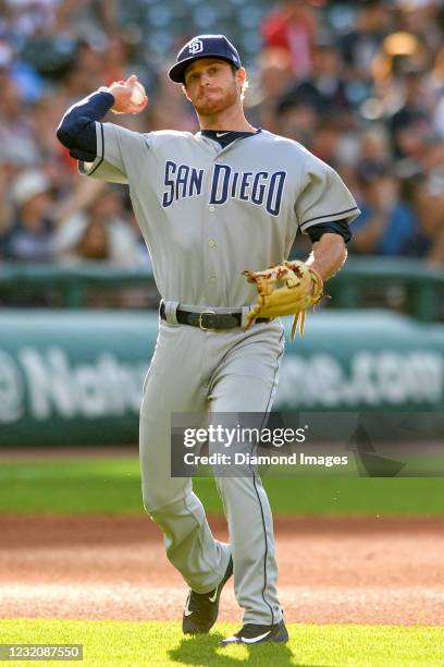 Third baseman Cory Spangenberg of the San Diego Padres warms up in the first inning of a game against the Cleveland Indians at Progressive Field on...