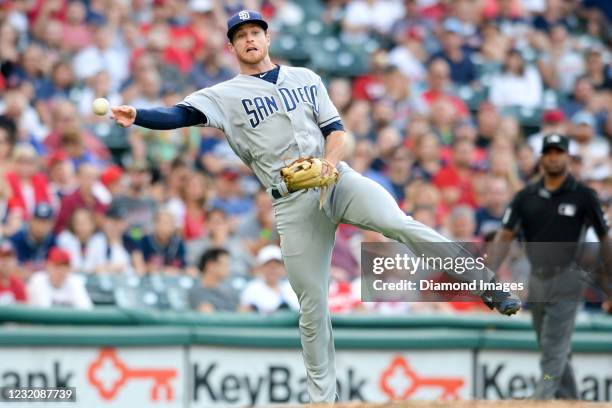 Third baseman Cory Spangenberg of the San Diego Padres throws toward first base in the third inning of a game against the Cleveland Indians at...