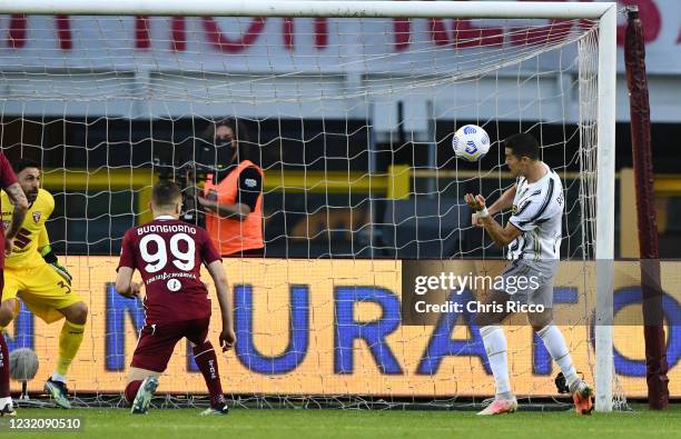 Cristiano Ronaldo of Juventus scores a goal during the Serie A match between Torino FC and Juventus at Stadio Olimpico di Torino on April 3, 2021 in...