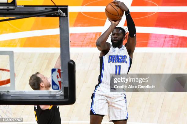 James Ennis III of the Orlando Magic shoots against Joe Ingles of the Utah Jazz during a game at Vivint Smart Home Arena on April 3, 2021 in Salt...