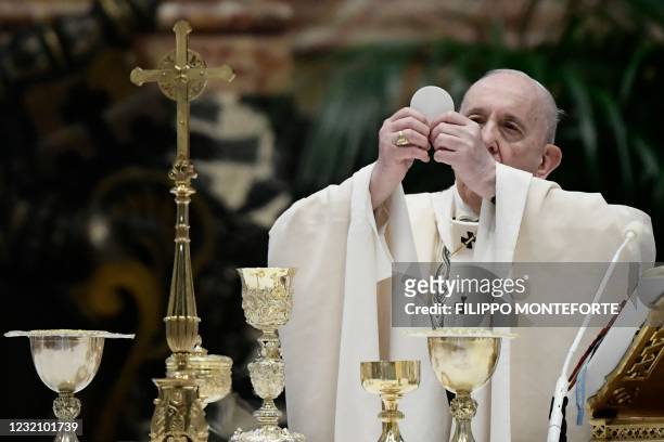 Pope Francis celebrates the Eucharist during Easter Mass on April 04, 2021 at St. Peter's Basilica in The Vatican during the Covid-19 coronavirus...