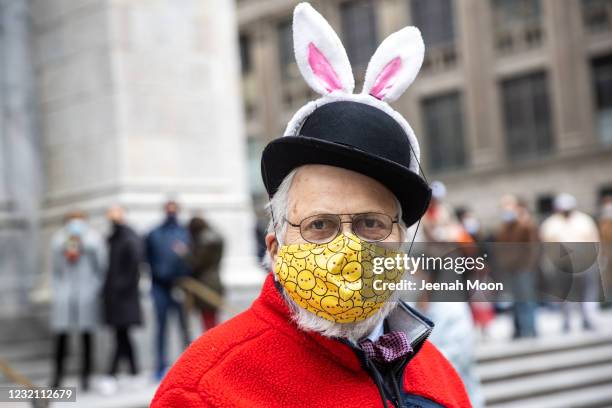 Man wears an Easter costume during the Easter Bonnet parade on Fifth Avenue in midtown on April 4, 2021 in New York City. The annual Easter Parade...