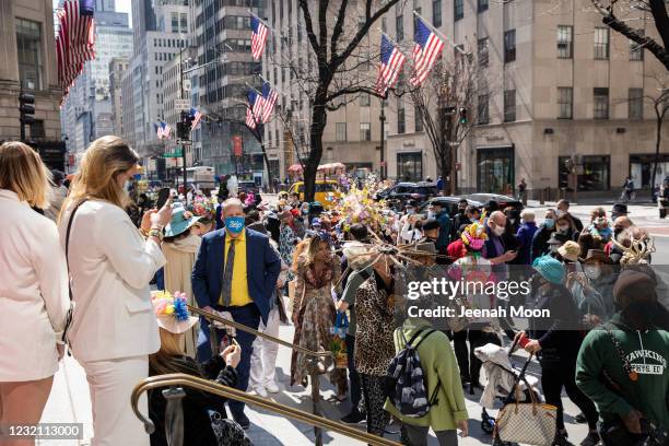 People in costumes participate during the Easter Bonnet parade on Fifth Avenue in midtown on April 4, 2021 in New York City. The annual Easter Parade...