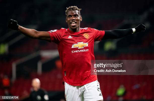 Paul Pogba of Manchester United celebrates assisting his teams second goal during the Premier League match between Manchester United and Brighton &...