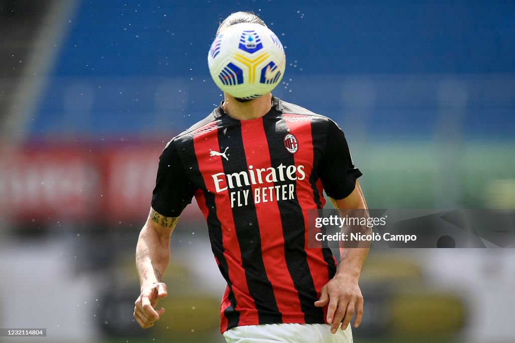 Zlatan Ibrahimovic of AC Milan in action as his face is...