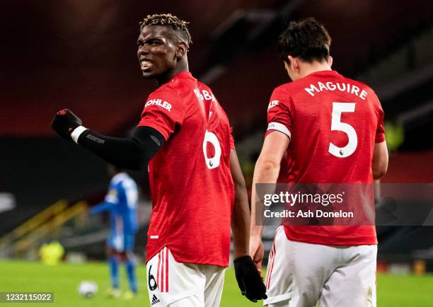 Paul Pogba of Manchester United celebrates assisting his teams second goal during the Premier League match between Manchester United and Brighton &...