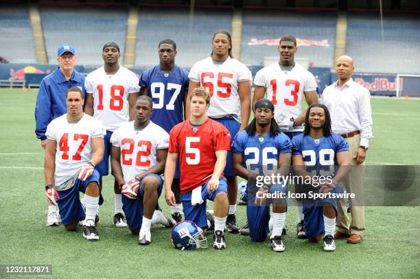 The 2009 draft class back row, head coach Tom Coughlin, wide receiver Hakeem Nicks , linebacker Clint Sintim , tackle William Beatty , wide receiver...