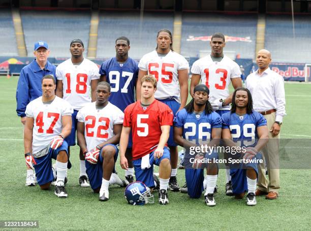 The 2009 draft class back row, head coach Tom Coughlin, wide receiver Hakeem Nicks , linebacker Clint Sintim , tackle William Beatty , wide receiver...