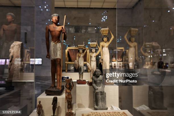 Statue is displayed at Egypt's new National Museum of Egyptian Civilisation , in the Fustat district of Old Cairo, Egypt, during its official...