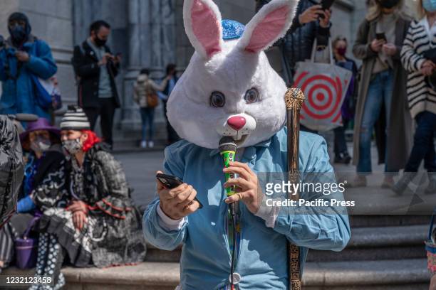 Rapper Rami Matan aka 'Kosha Dillz' dressed as Bunny with Jewish kippah performs during Easter Bonnet parade on 5th Avenue in front of St. Patricks...