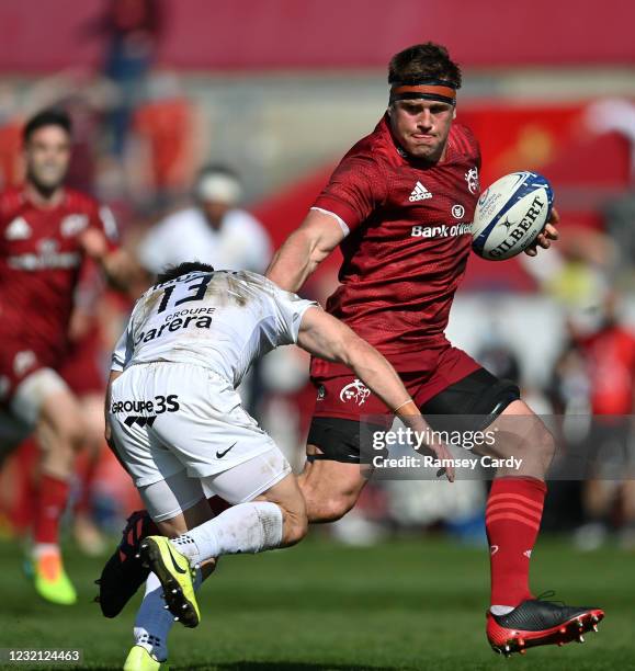 Limerick , Ireland - 3 April 2021; CJ Stander of Munster is tackled by Zack Holmes of Toulouse during the Heineken Champions Cup Round of 16 match...
