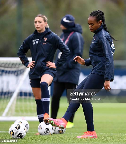 France's women national football team forward Marie Antoinette Katoto passes the ball during a training session in Clairefontaine-en-Yvelines, near...