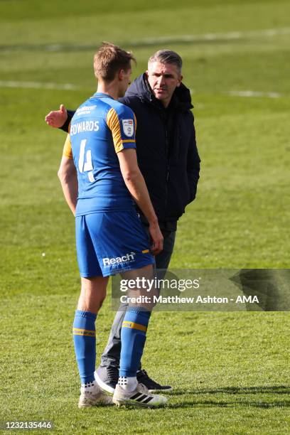 David Edwards of Shrewsbury Town and Ryan Lowe the head coach / manager of Plymouth Argyle and former Shrewsbury Town player during the Sky Bet...