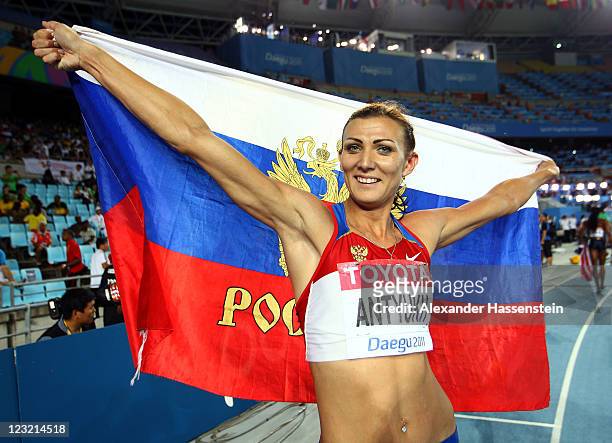 Natalya Antyukh of Russia celebrates winning bronze in the women's 400 metres hurdles final during day six of the 13th IAAF World Athletics...