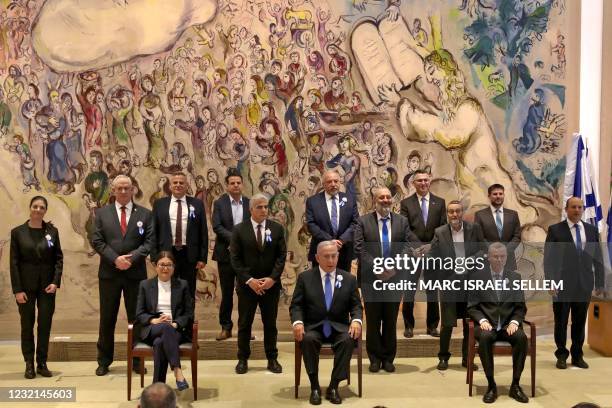 Israeli Prime Minister Benjamin Netanyahu along with party leaders pose for a group photo at Chagall State Hall in the Knesset building following the...