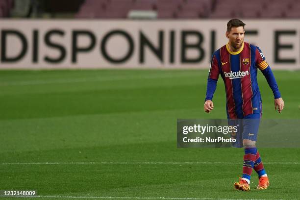 Lionel Messi of Barcelona walks during the La Liga Santander match between FC Barcelona and Real Valladolid CF at Camp Nou on April 5, 2021 in...