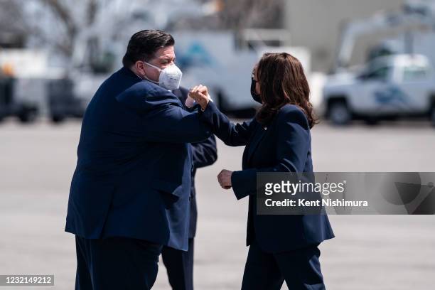 Vice President Kamala Harris is greeted by Illinois Governor J.B. Pritzker after disembarking from Air Force 2 on Tuesday, April 6, 2021 in Chicago,...