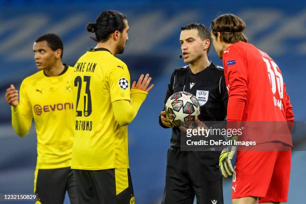 Emre Can of Borussia Dortmund, referee Sven Jablonski and goalkeeper Marwin Hitz of Borussia Dortmund discusses during the UEFA Champions League...