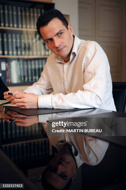 French trader Jerome Kerviel poses, February 5, 2008 during an exclusive interview with AFP at one of his lawyers' office in Paris. Kerviel was...