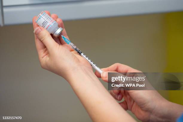 Nurse prepares the Moderna Covid-19 vaccine, at the West Wales General Hospital in Carmarthen, on April 7, 2021 in Carmarthen, Wales. Moderna, the...