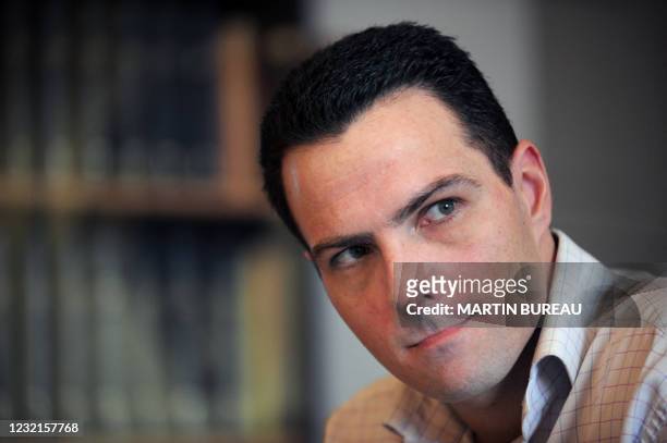 French trader Jerome Kerviel poses, February 5, 2008 at one of his lawyers' office in Paris. Kerviel was questioned today by judges investigating his...