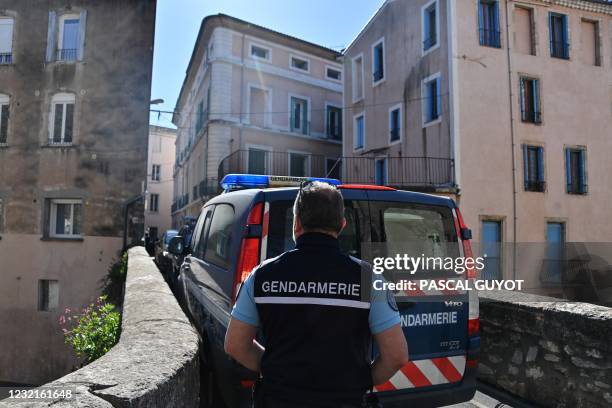 Gendarmes block a street in Bedarieux, southern France, on April 7 during an investigation at the location where a body was found hidden under a...