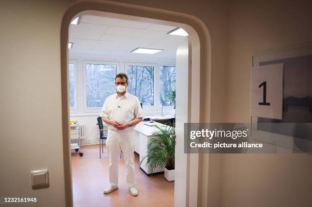 April 2021, Hamburg: Björn Parey, general practitioner, stands in his practice in Hamburg-Volksdorf. Hamburg's general practitioners began giving...