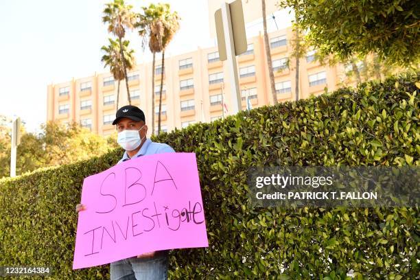 Worker protest outside the closed Four Points by Sheraton LAX hotel as they call for an investigation by the US Small Business Administration into...