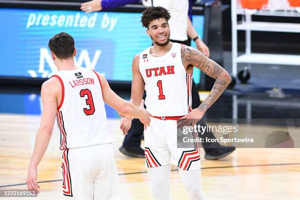 Utah Utes forward Timmy Allen looks on with Utah Utes guard Pelle Larsson during the first round game of the men's Pac-12 Tournament between the Utah...