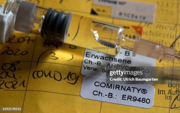 This illustration photo shows a vaccination pass with the entry about a corona vaccination with the BioNTech vaccine, on April 08, 2021 in Bonn,...