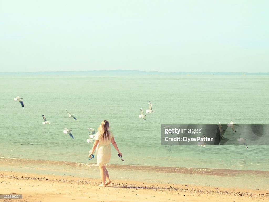 Young girl by sea