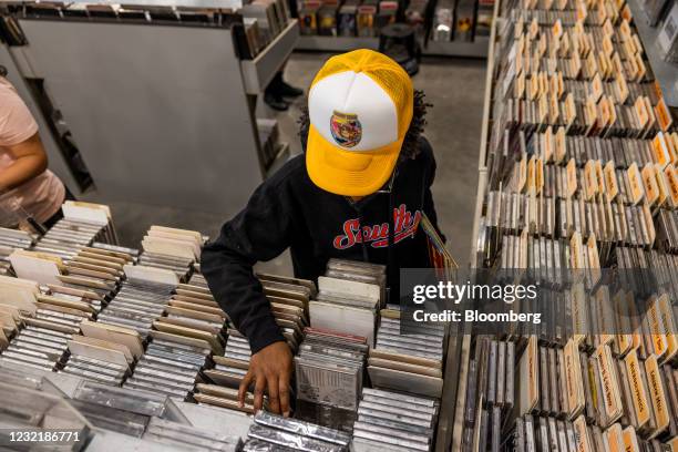 Shoppers browse CDs at an Amoeba Music store in Los Angeles, California, U.S. On Thursday, April 8, 2021. California officials plan to fully reopen...