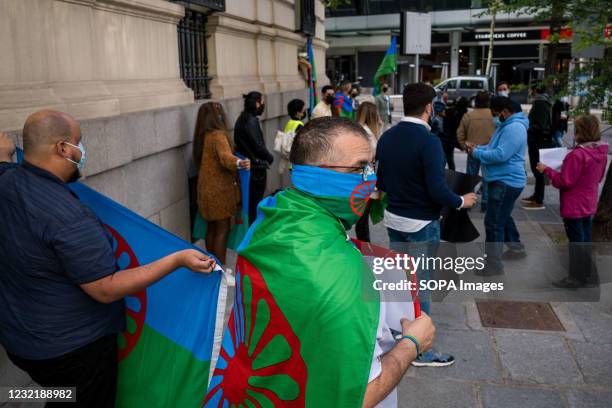 Gypsy community members hold flags during the demonstration. As part of the International Day of the Gypsy People, the Gypsy community in Madrid...