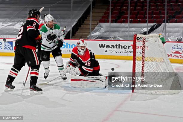 Shot by Miro Heiskanen of the Dallas Stars goes by Kevin Lankinen of the Chicago Blackhawks for a goal in the second period at the United Center on...