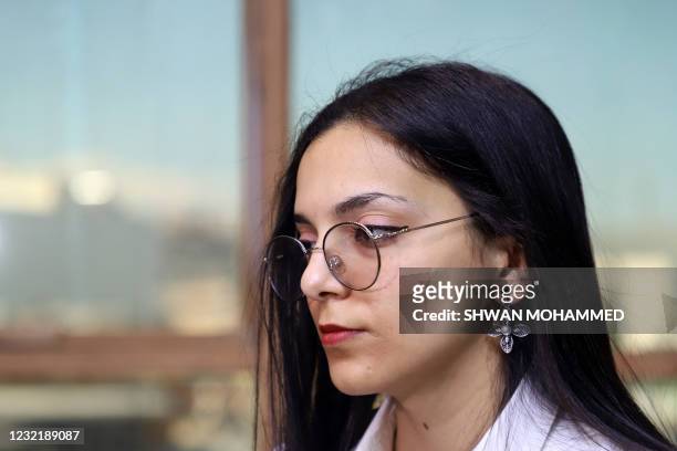 Rawan Salim, an 18-year-old activist, poses for a picture during an interview in the northeastern city of Sulaymaniyah in Iraq's autonomous Kurdistan...