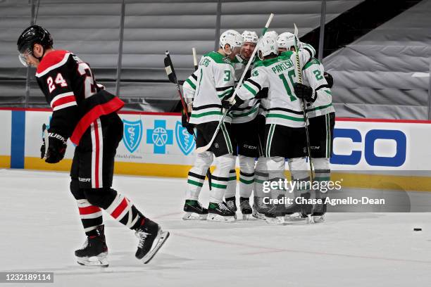 Miro Heiskanen of the Dallas Stars celebrates with teammates after scoring a goal in the second period against the Chicago Blackhawks at the United...