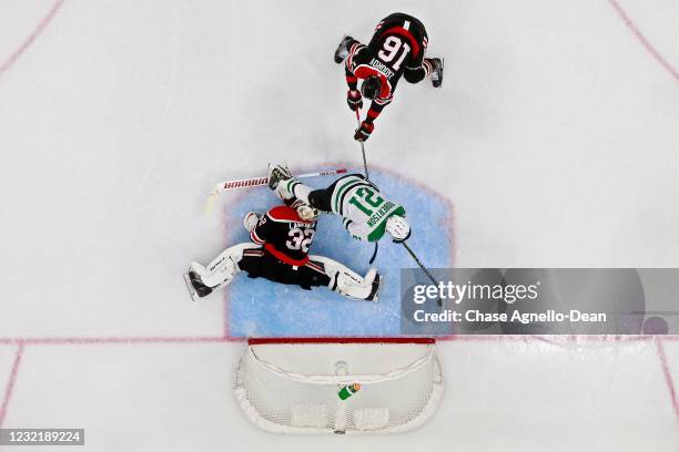 Jason Robertson of the Dallas Stars scores a goal past Nikita Zadorov and Kevin Lankinen of the Chicago Blackhawks in the second period at the United...