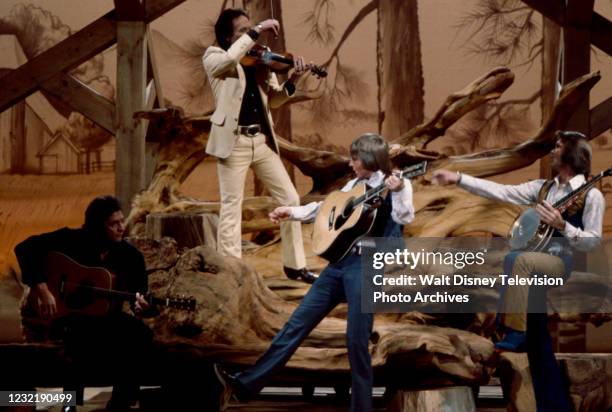 Johnny Cash, Roger Miller, John Denver, Glen Campbell performing on the ABC tv special 'John Denver: Thank God I'm a Country Boy'.