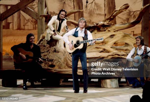 Johnny Cash, Roger Miller, John Denver, Glen Campbell performing on the ABC tv special 'John Denver: Thank God I'm a Country Boy'.