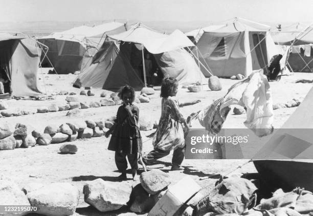 Two Palestinian girls play in August 1967 in Wadi Dalail refugee camp in Jordan. After the Israeli army started a lightning war in Syria, Sinaï and...
