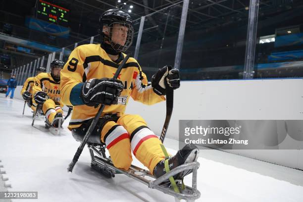The player leaves the ice rink during a break time in the Para Ice Hockey test event for the Beijing 2022 Winter Olympics at National Indoor Stadium...