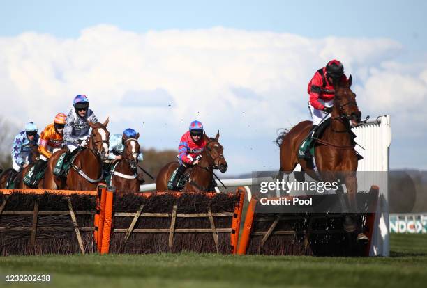 Derek Fox riding Ahoy Senor on their way to winning the Doom Bar Sefton Novices' Hurdle during Ladies Day of the 2021 Randox Health Grand National...