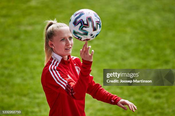 Lea Schuller of Germany spins a ball on her finger during Germany Women's Training Session ahead of the International Friendly between Germany and...