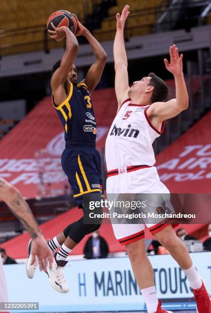 Giannoulis Larentzakis, #5 of Olympiacos Piraeus competes with Errick McCollum, #3 of Khimki Moscow Region during the 2020/2021 Turkish Airlines...