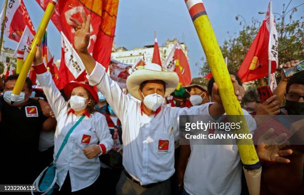 Peruvian presidential candidate for the radical leftist party Peru Libre , Pedro Castillo, holds a giant pencil during the closing rally of his...